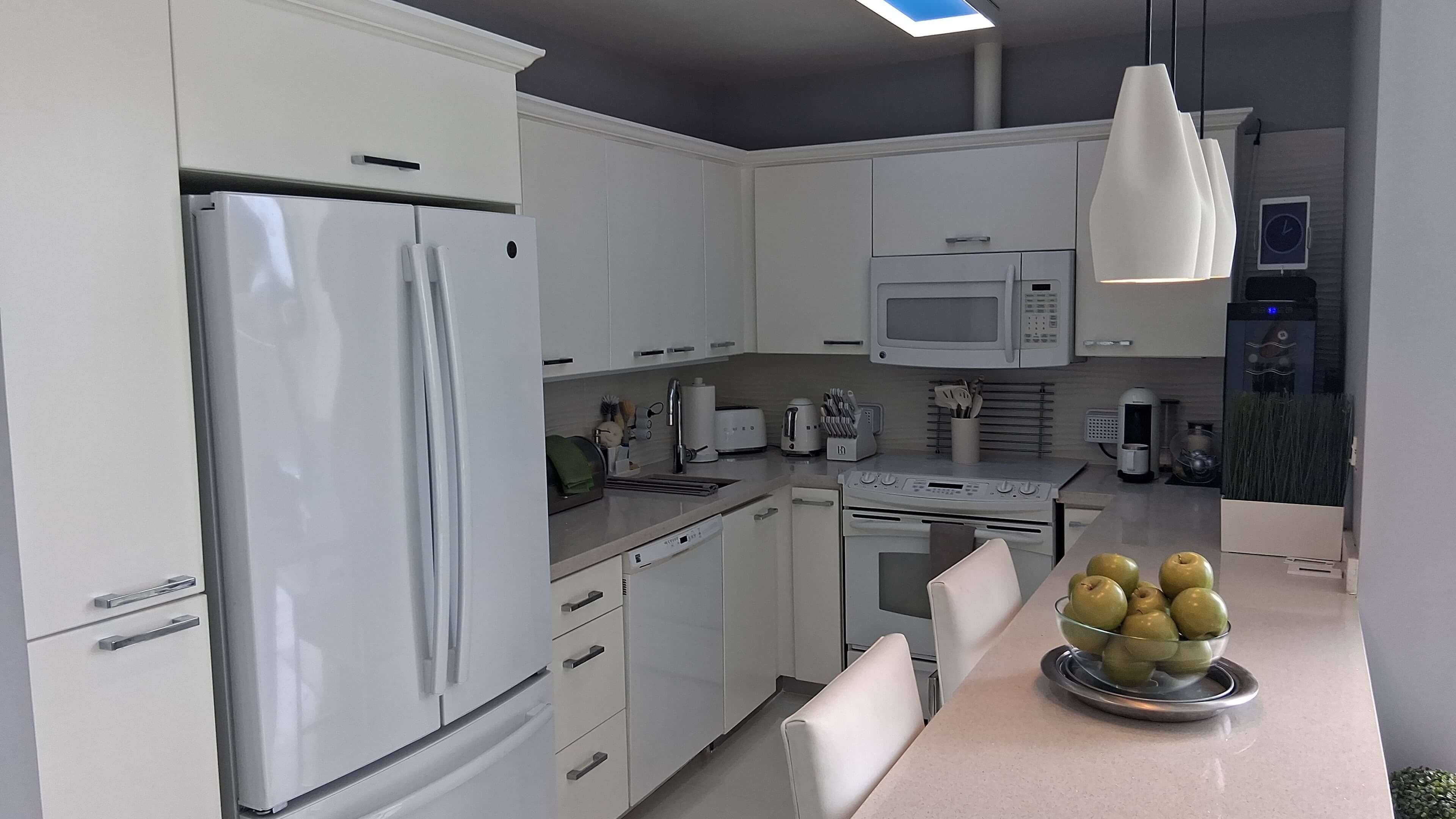 Kitchen remodel with pendant lighting over the island